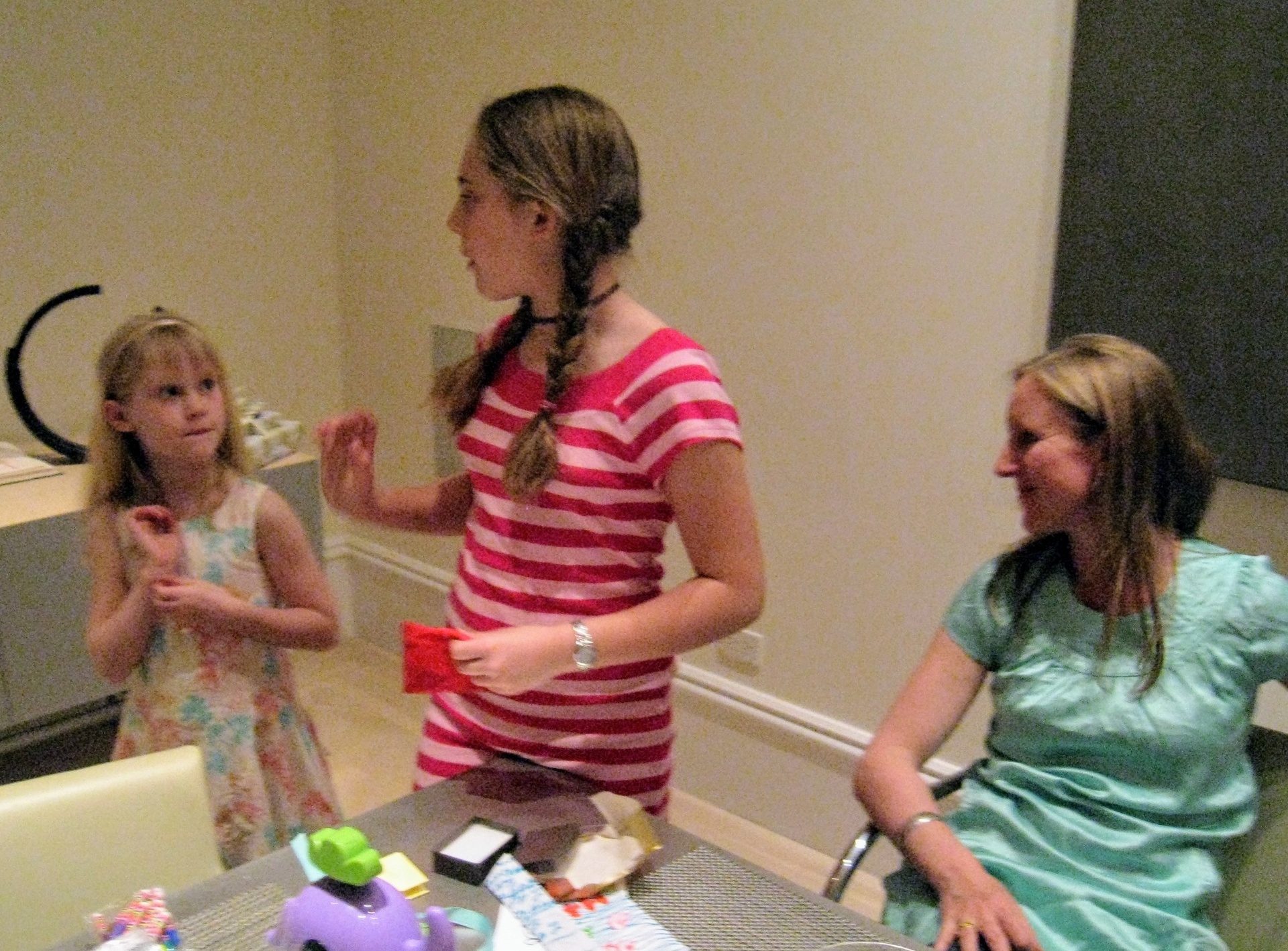 Claire, Julia, and Isabelle at a birthday celebration
