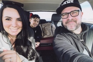 Thomas, Laura, and Easton together in the car